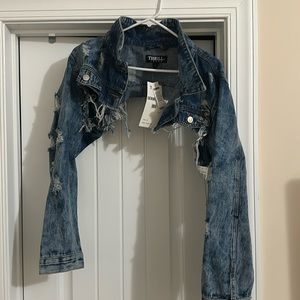 Cropped distressed Jean jacket.